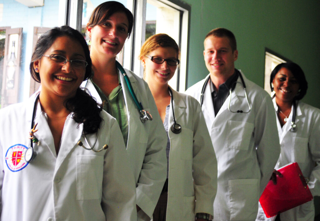 Trinity students in line at a medical school clinical