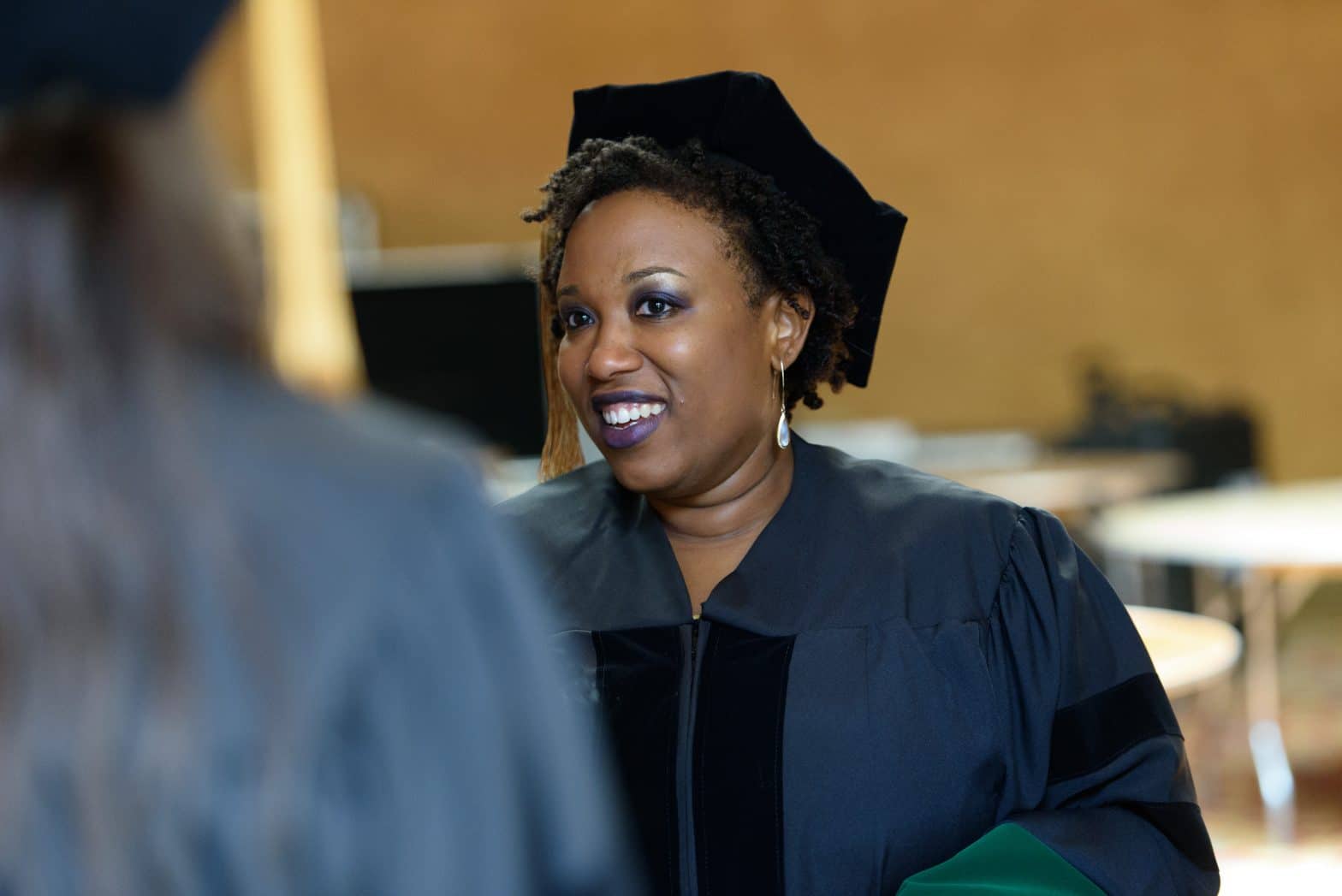 Trinity medical school graduate at ceremony