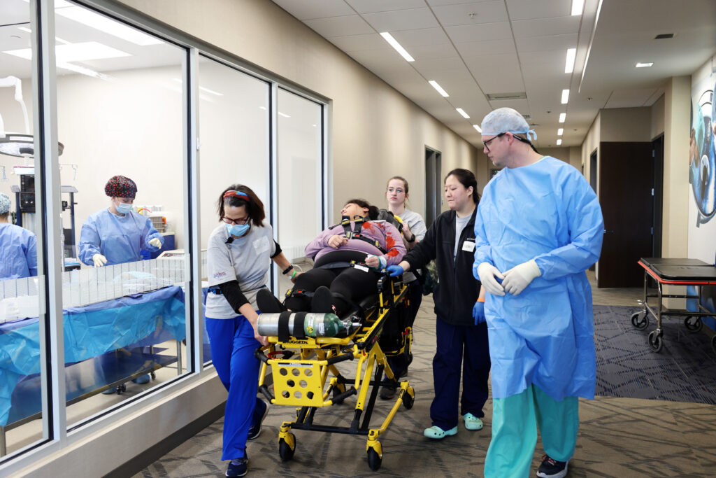 Group of Caribbean medical school students particiating in a clinical transition term disaster activity