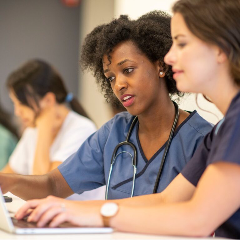 two students sitting at a lab, representing caribbean medical school rankings